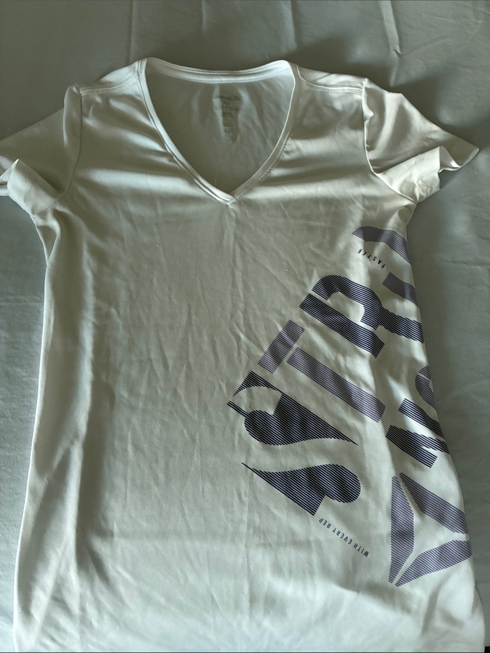 Reebok White V-Neck Short Sleeve Tee with Navy Graphic